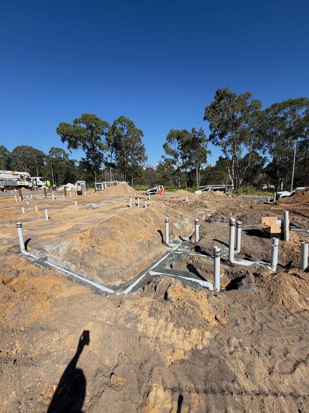 Pre-pour drainage stubs on slab